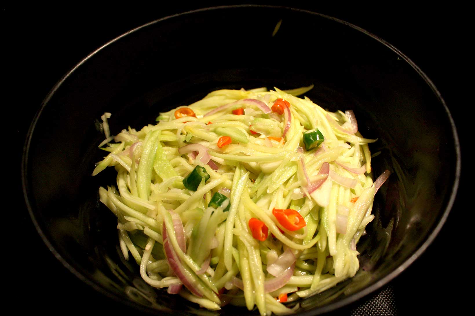 Pickled Sour Green Mango Salad with Chili and Peanuts