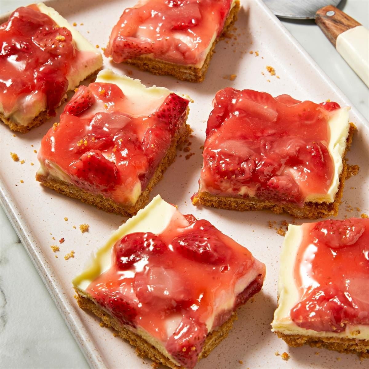 Layered Strawberry Lemon Cheesecake Bars