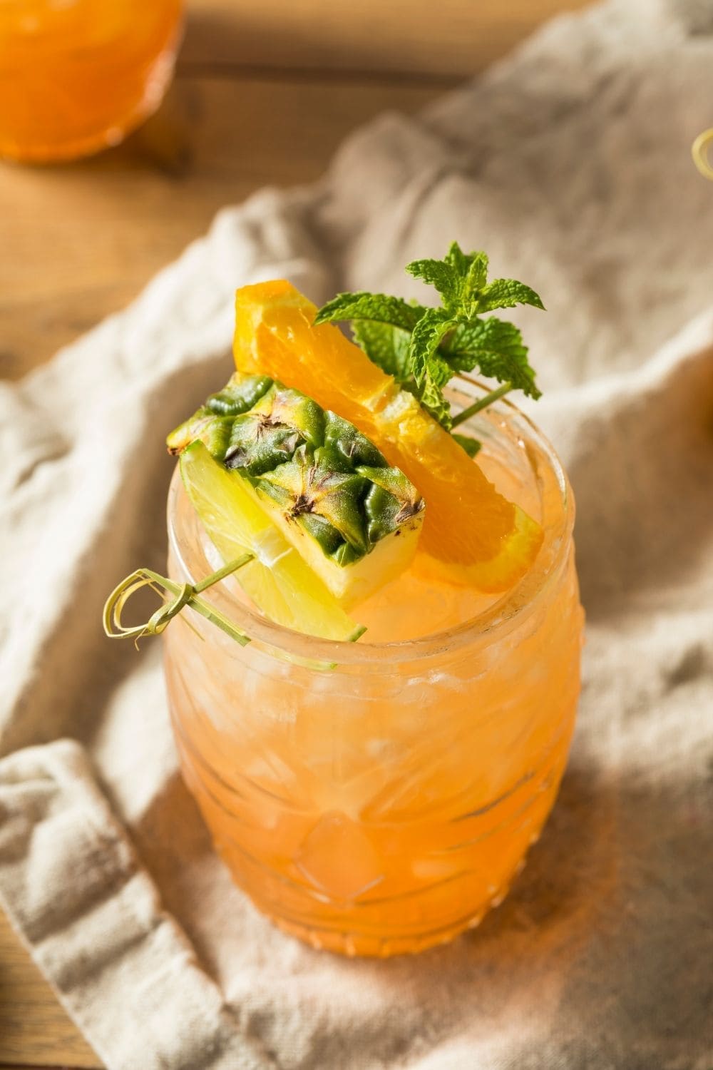 Tiki-Style Pineapple Rum Cocktail with Fresh Lime and Mint
