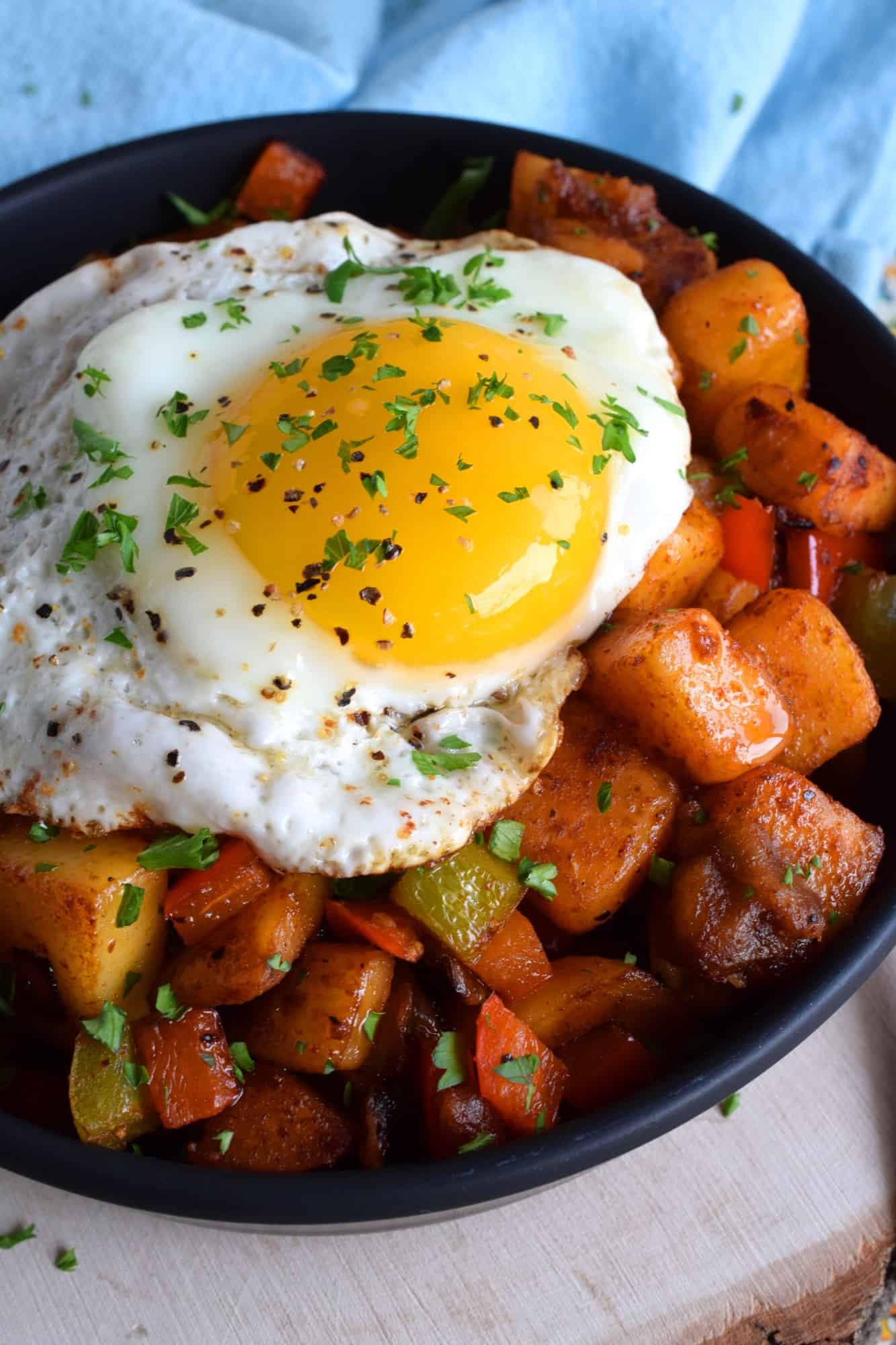 Skillet-Roasted Breakfast Potatoes with Bell Peppers and Eggs