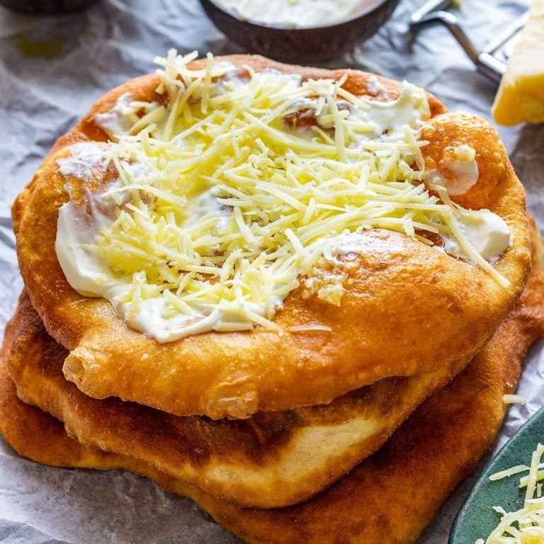Fried Hungarian Lángos Flatbread with Garlic and Sour Cream