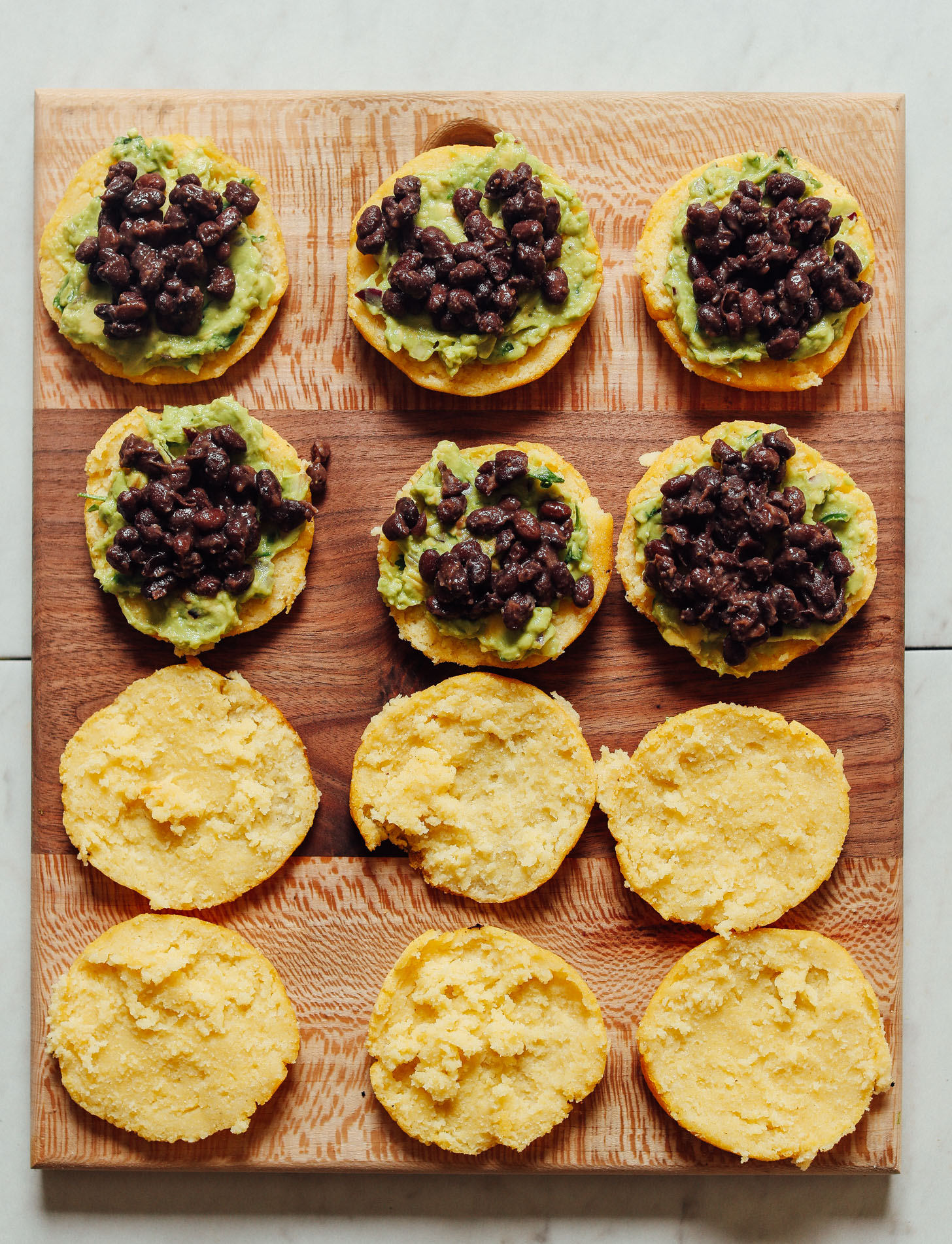 Pan-Seared Arepas with Black Bean and Avocado Salsa
