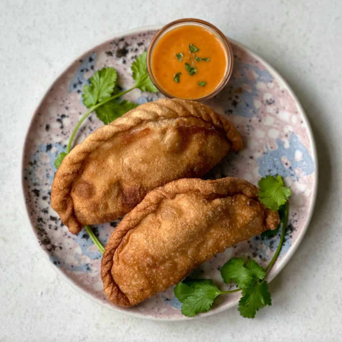 Pan-Fried Tibetan Shapale with Spiced Lamb and Onion