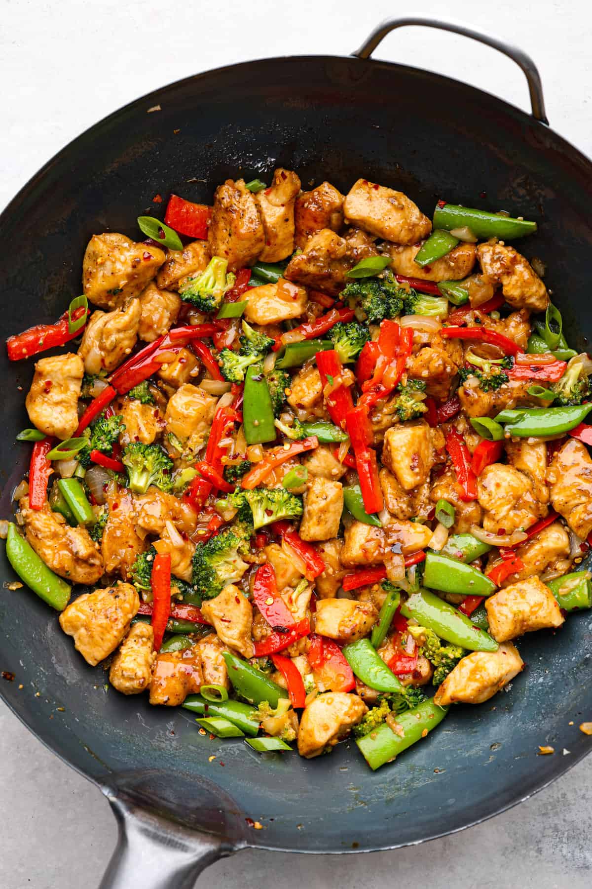 Szechuan-Style Tofu Stir Fry with Crispy Peanuts and Chili Oil