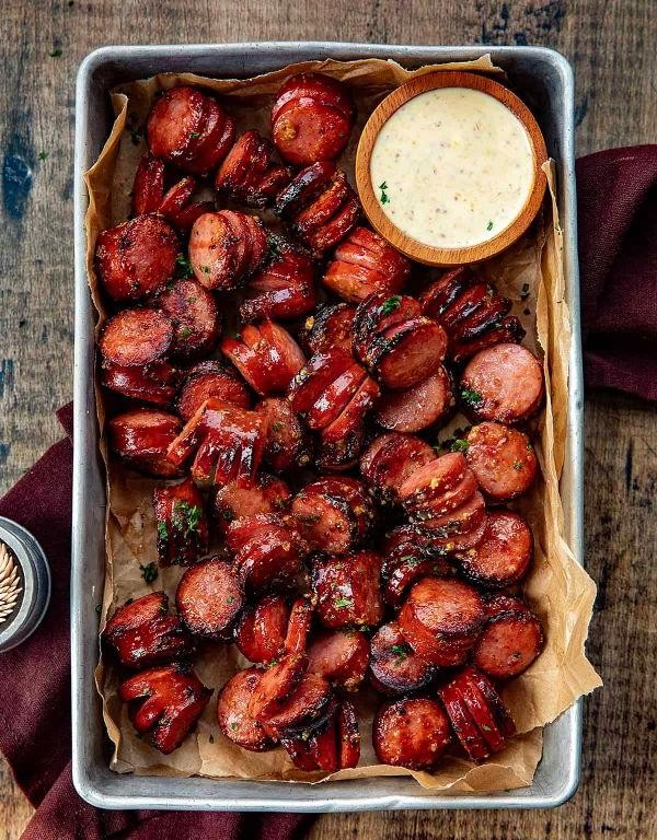 Grilled Kielbasa with Caramelized Onions and Spicy Mustard Sauce