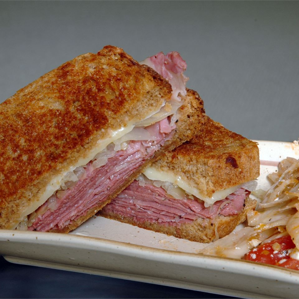 Smoked Pastrami Sandwich with Pepperjack Brat and Pickled Onions