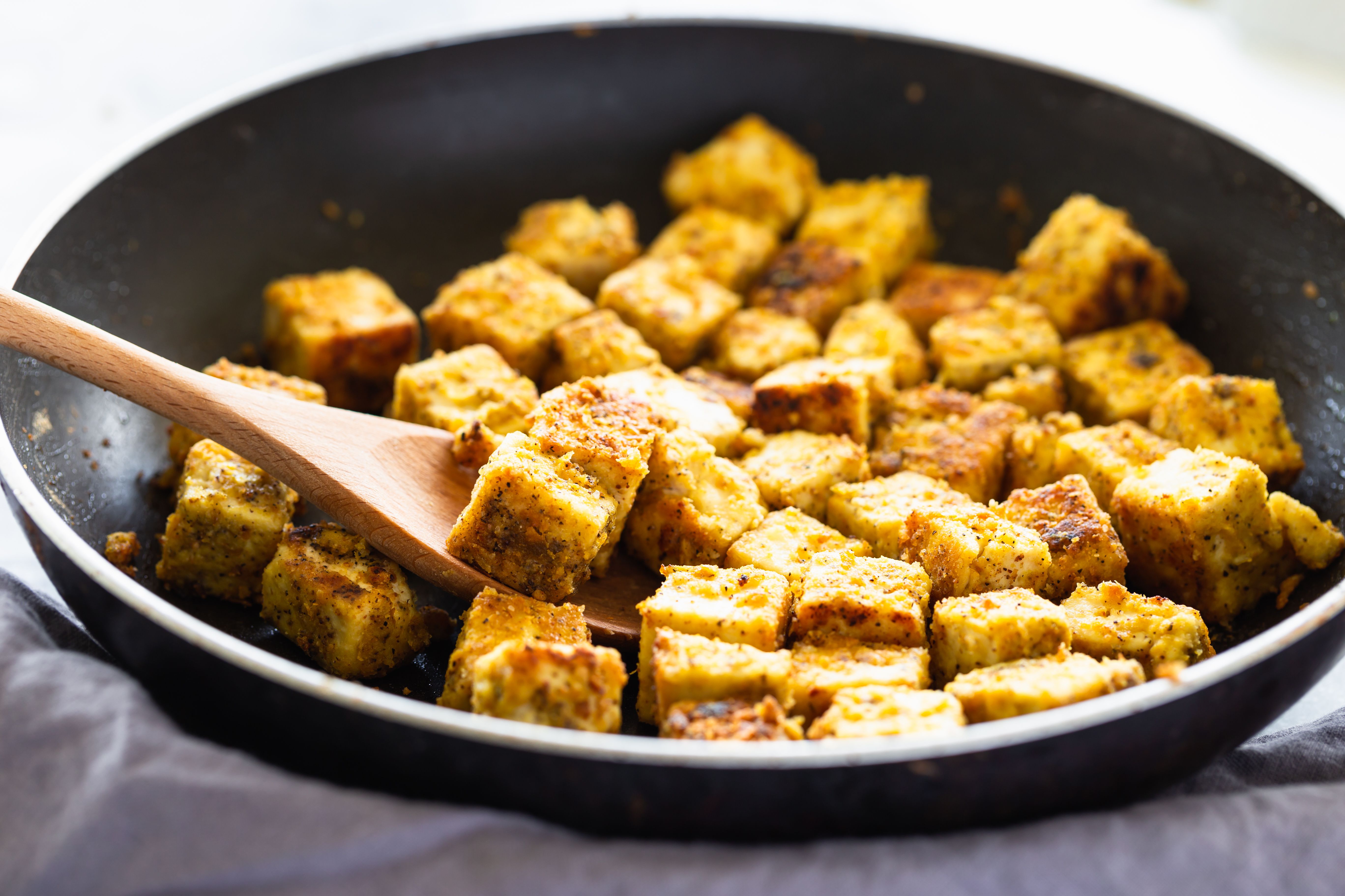 Crispy Pan-Fried Tofu with Spiced Peanut Sauce