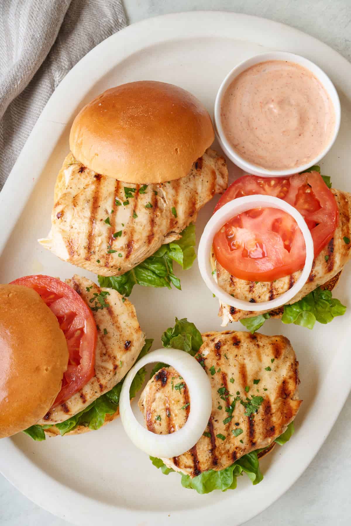 Grilled Chicken Sandwiches with Spicy Aioli and Pickled Onions