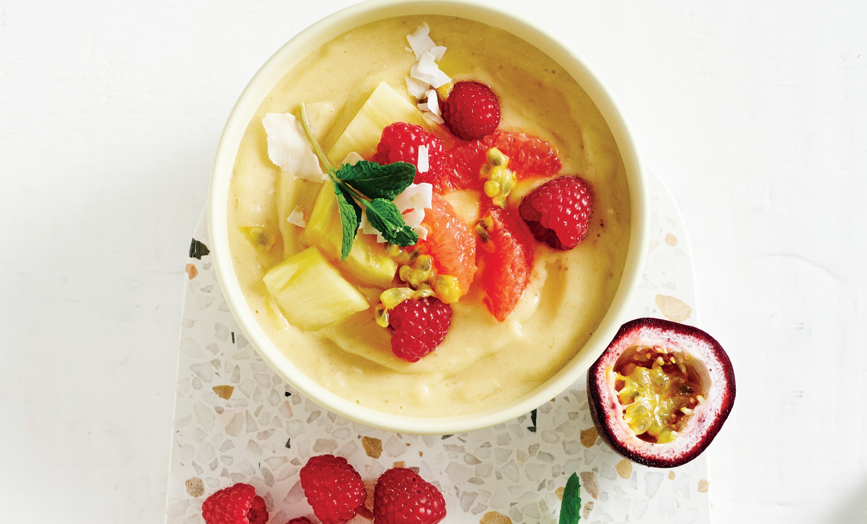 Tropical Fruit Smoothie Bowl with Fresh Coconut Whipped Cream