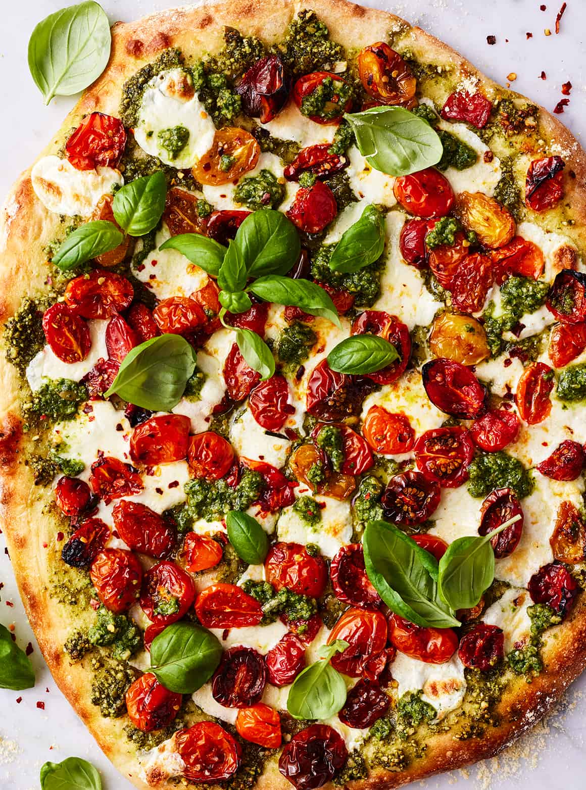 Kale Pesto Pizza with Mozzarella and Sun-Dried Tomatoes
