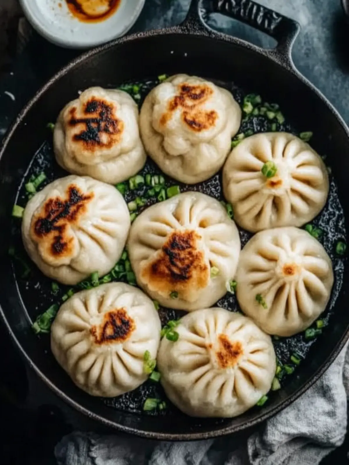 Pan-Seared Shanghai-Style Pork Buns with Scallion Soy Glaze