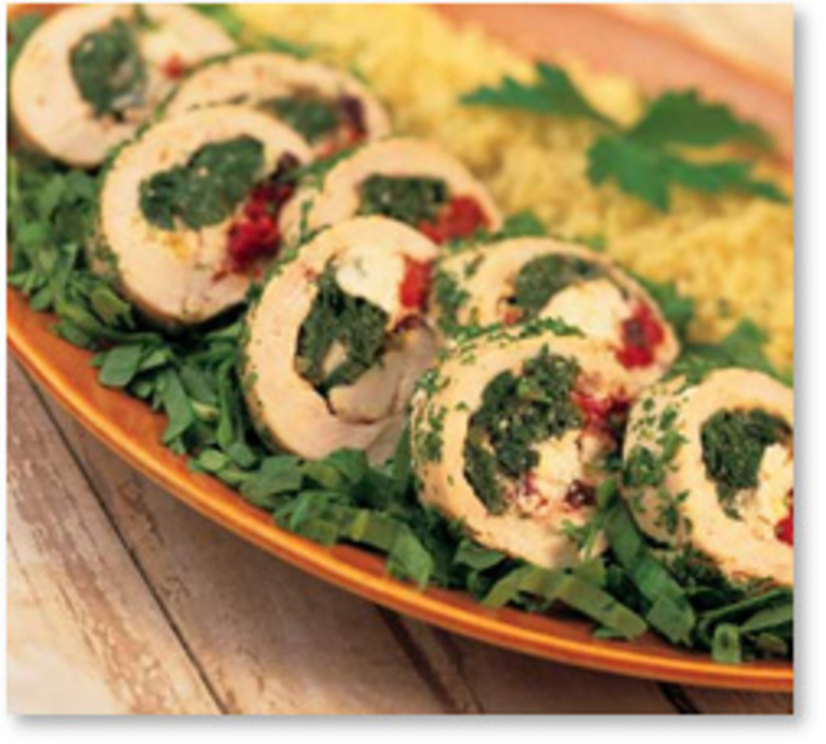 Sun-Dried Tomato & Herb Stuffed Chicken Breast with Lemon-Garlic Sauce