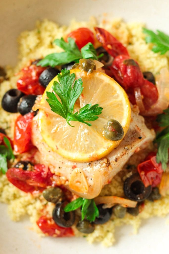 Baked Cod with Tomato-Olive Sauce and Herb Couscous