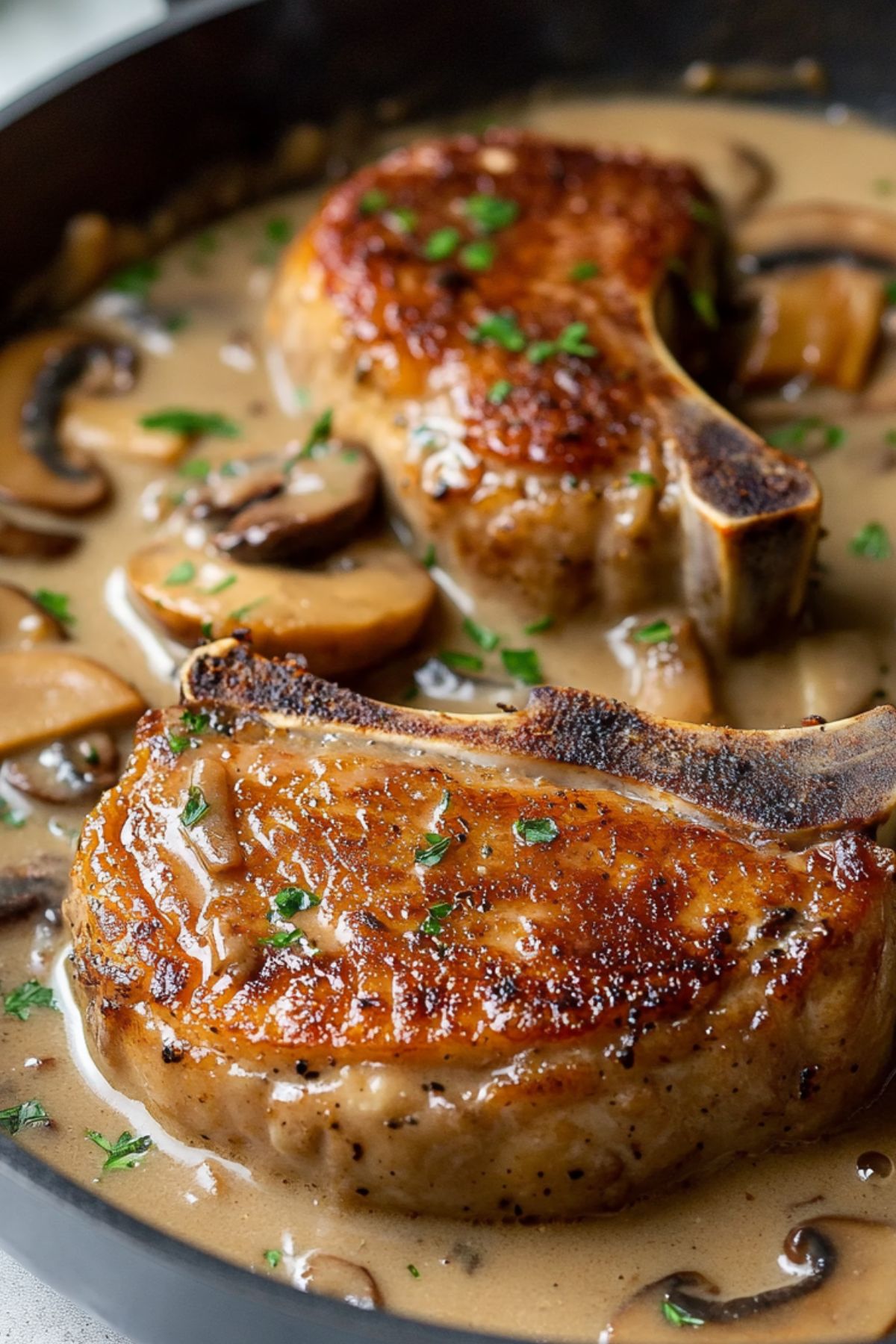 Pan-Seared Pork Chops with Bacon Mushroom Gravy