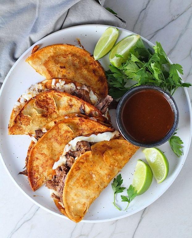 Spiced Beef Birria Tacos with Roasted Tomato Consommé