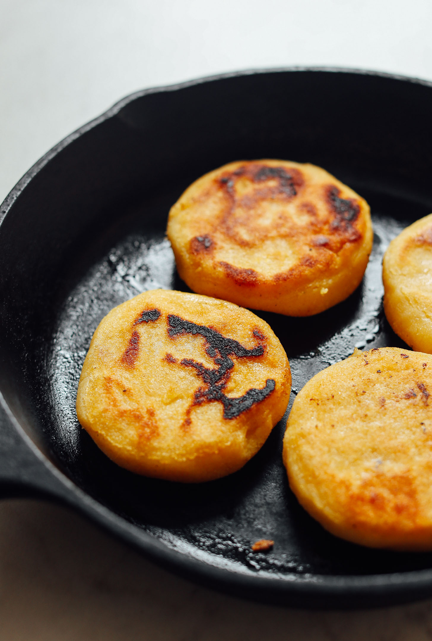 Pan-Fried Cornmeal Arepas with Queso Blanco Filling