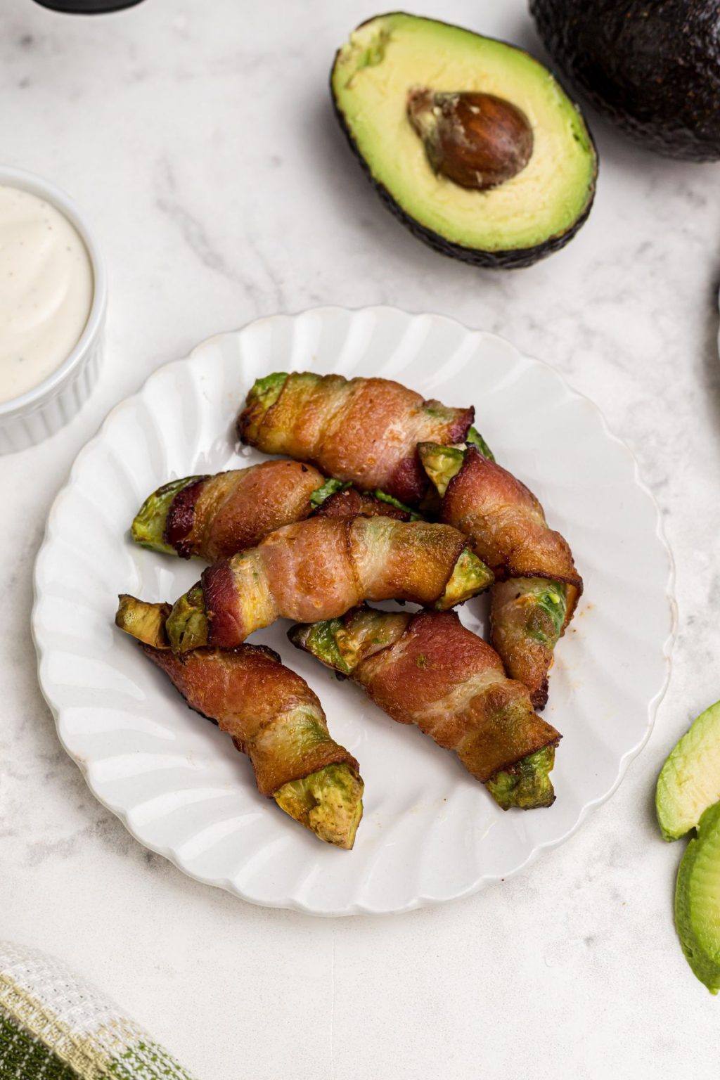 Crispy Bacon-Wrapped Avocado with Creamy Herb Sauce