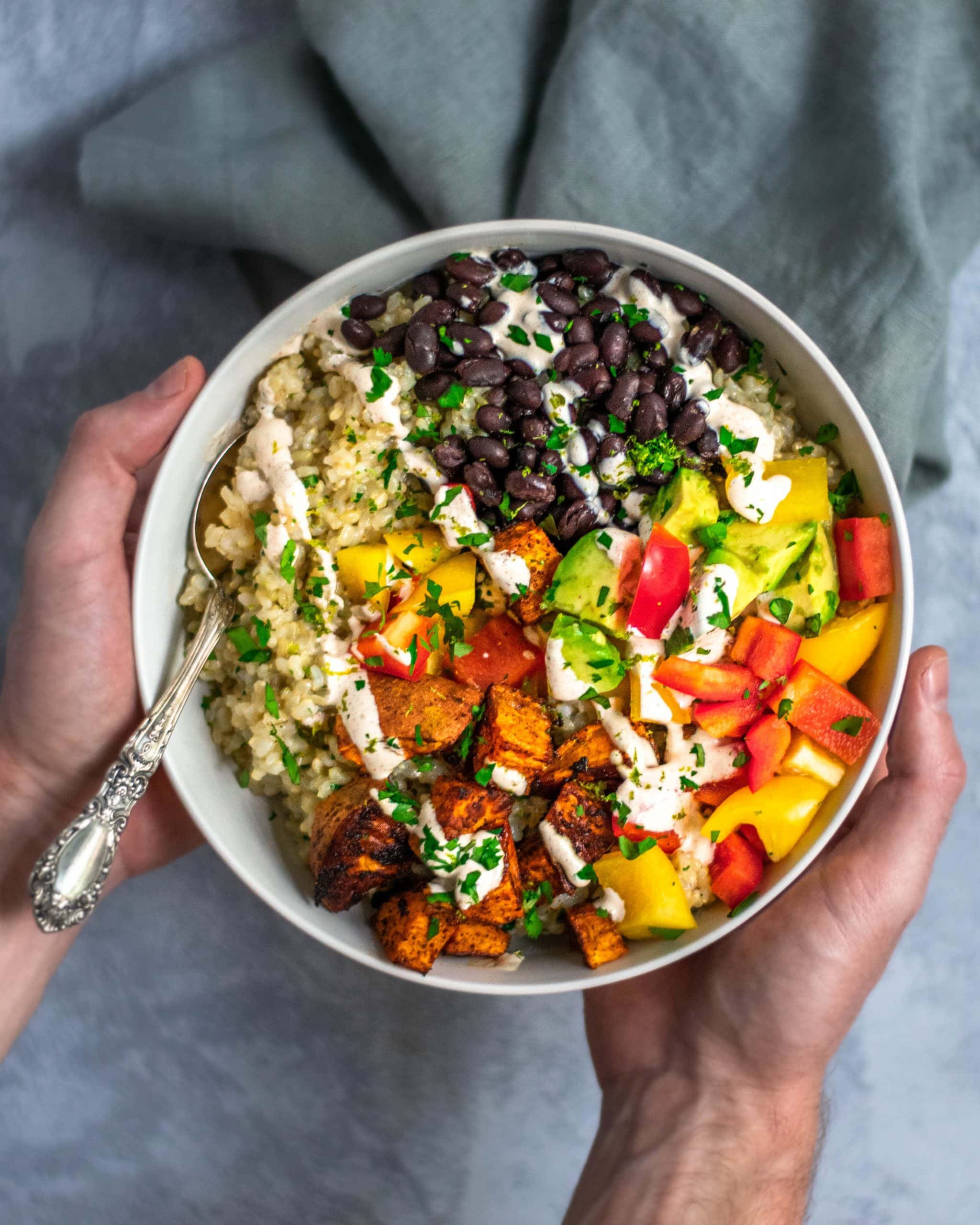 Soulful Roasted Sweet Potato and Black Bean Bowl with Cilantro Lime Dressing