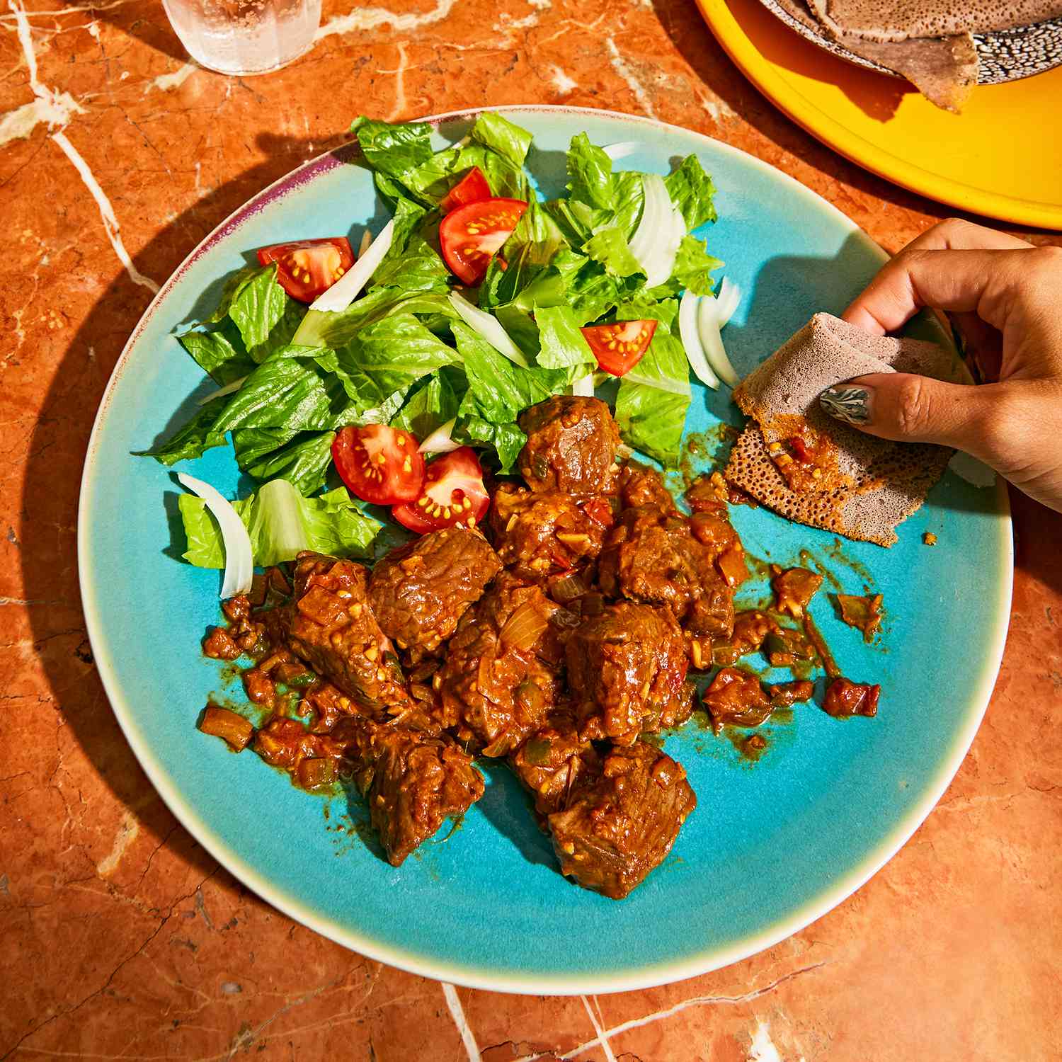 Braised Lamb Tibs with Rosemary and Cardamom