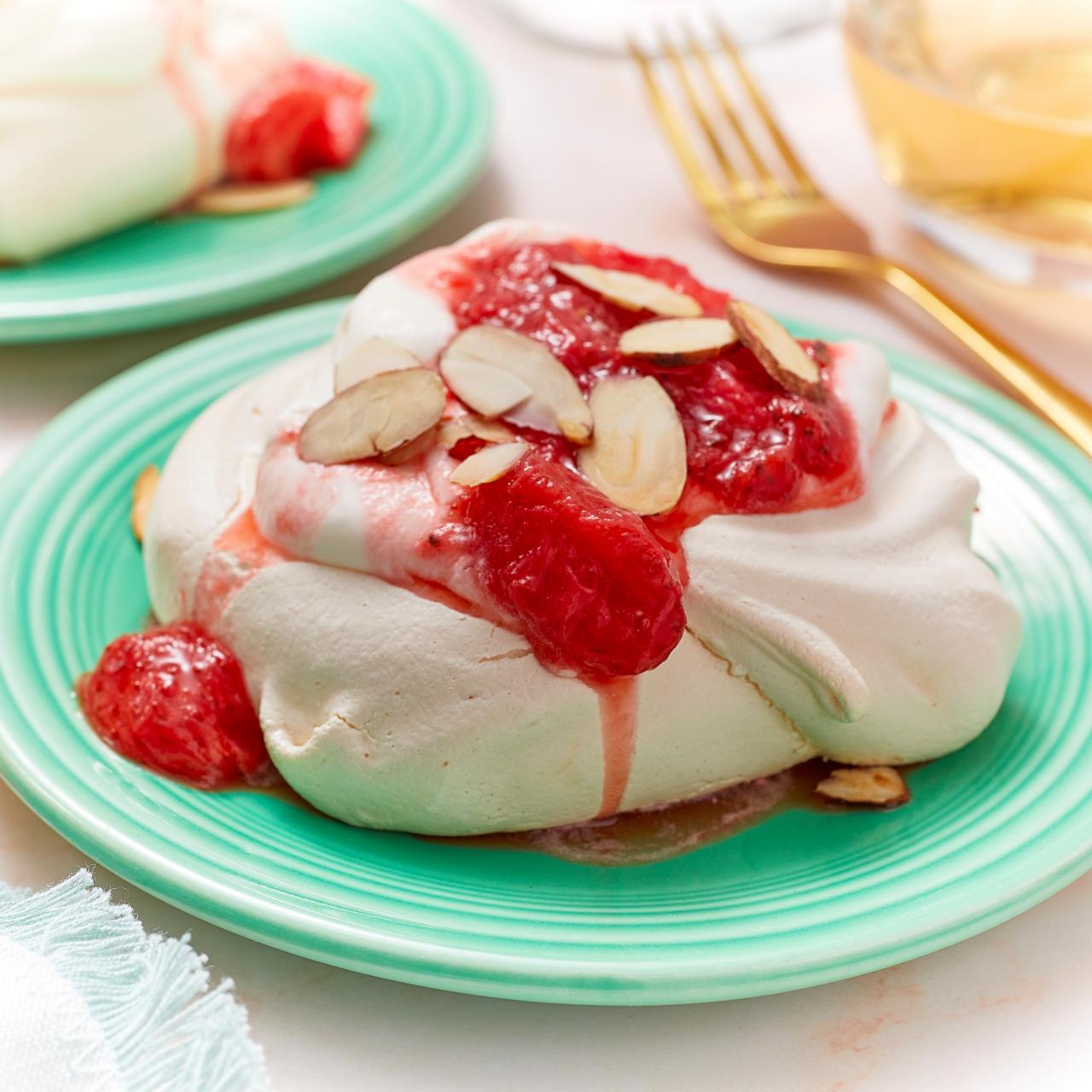 Strawberry-Rosewater Pavlova with Whipped Cream and Pistachios