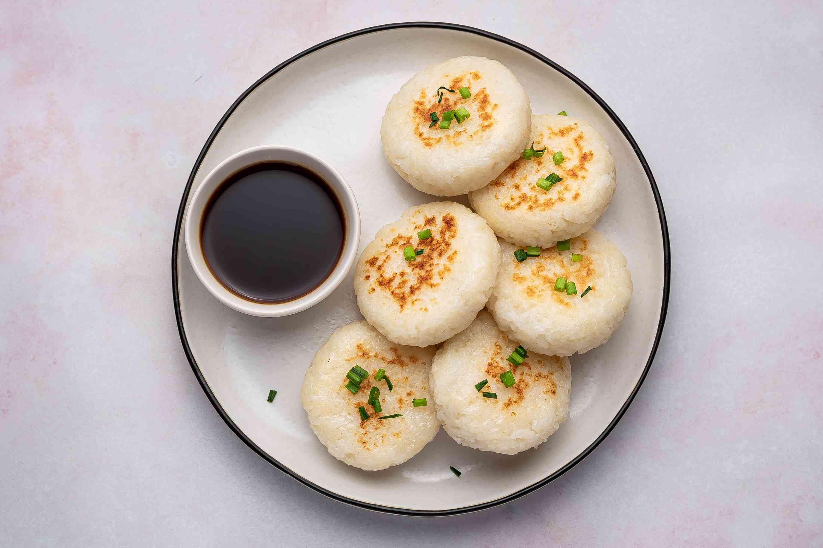 Pan-Seared Shanghai-Style Glutinous Rice Cakes with Soy Dipping Sauce