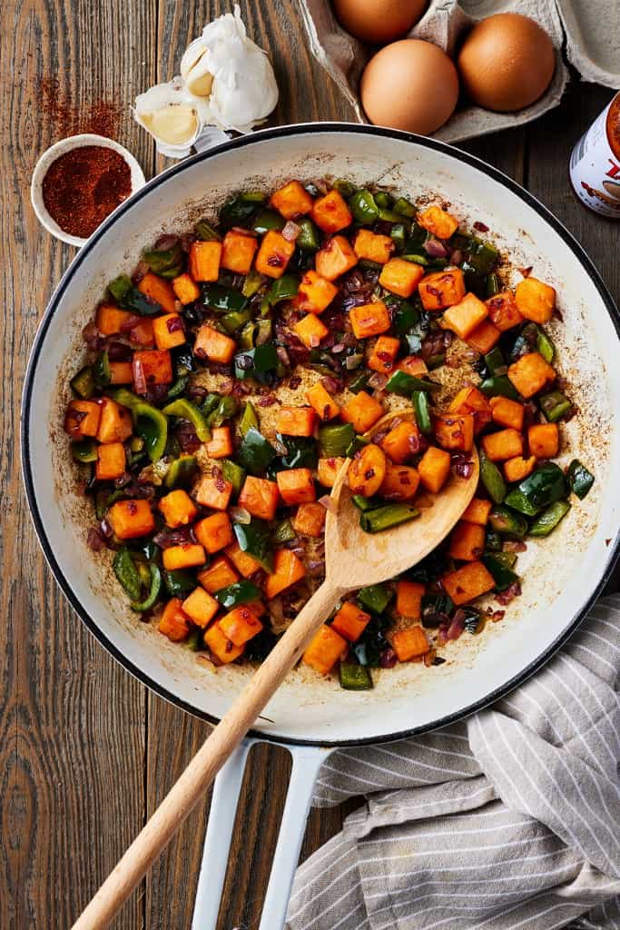 Sautéed Sweet Potato and Spinach Hash with Poached Eggs