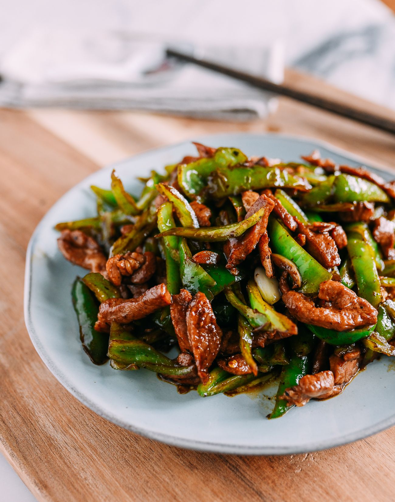 Tamarind-Glazed Pork Stir Fry with Bell Peppers and Snow Peas