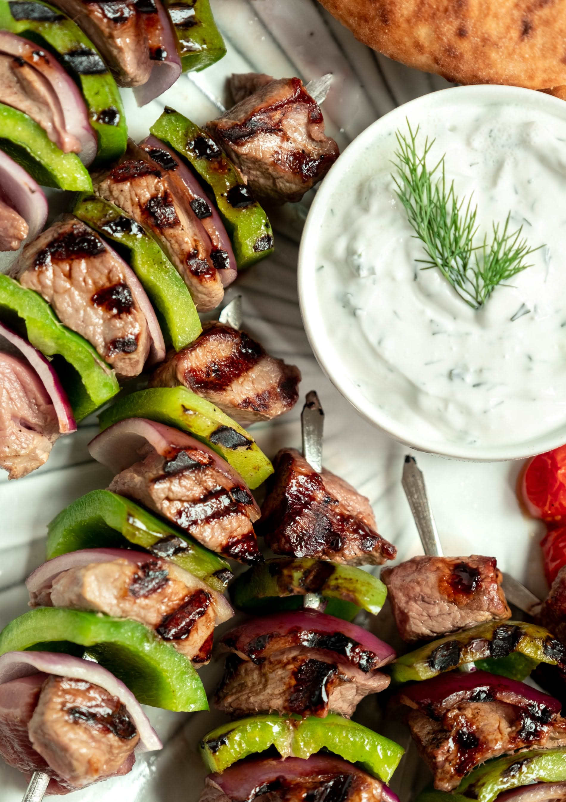 Grilled Za’atar Lamb Skewers with Tzatziki and Pita