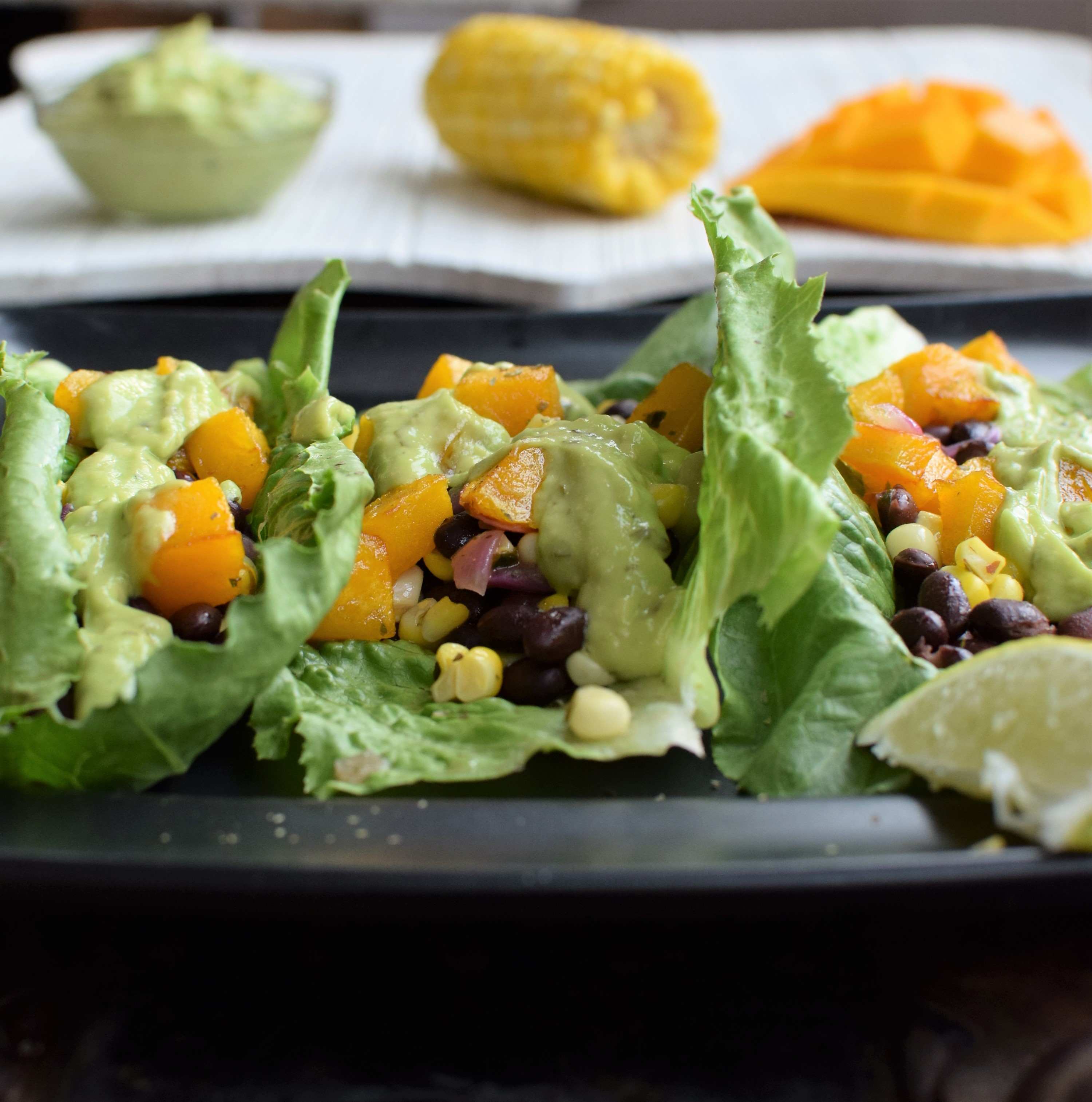 Grilled Corn and Black Bean Tacos with Avocado Crema