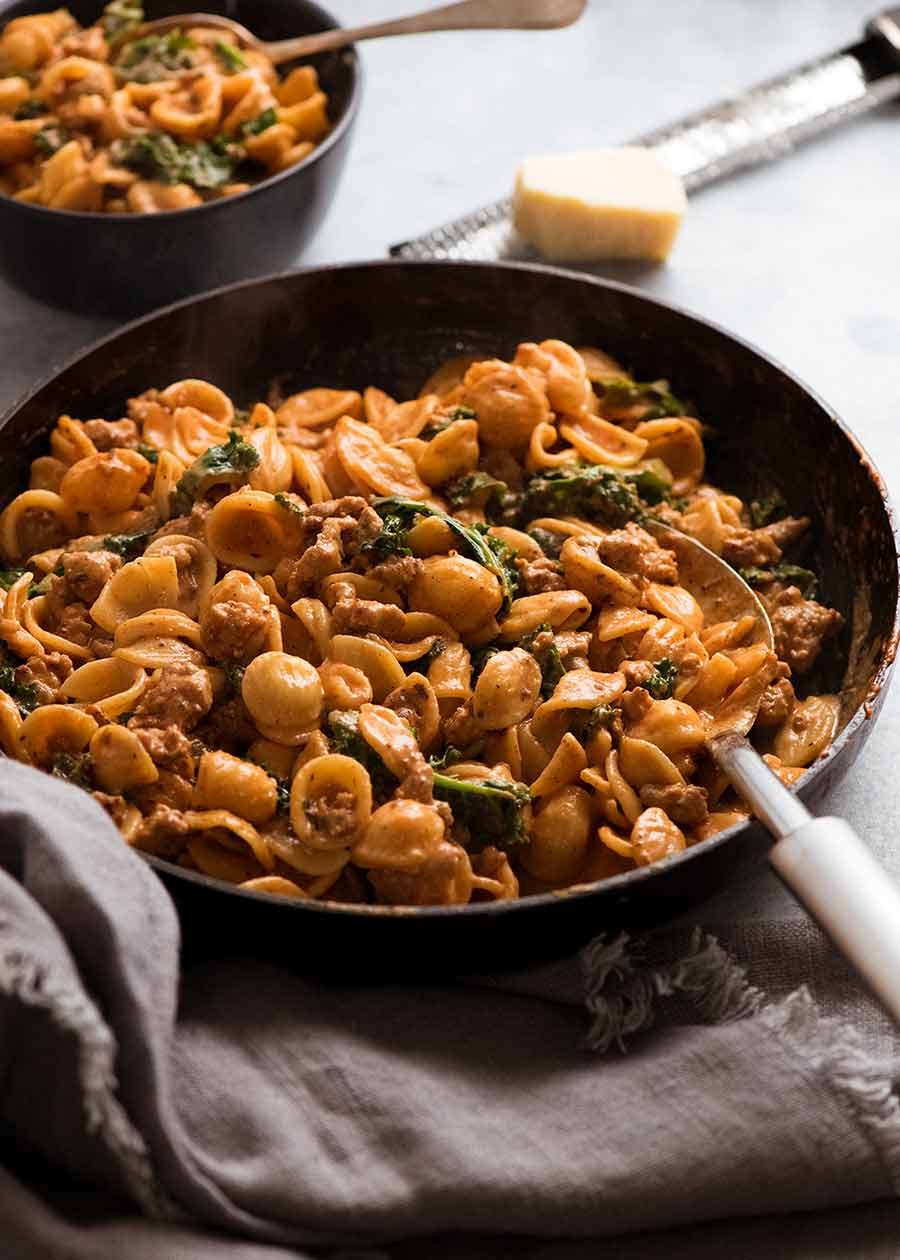 Sautéed Orecchiette with Prosciutto, Peas, and Tomato Cream Sauce