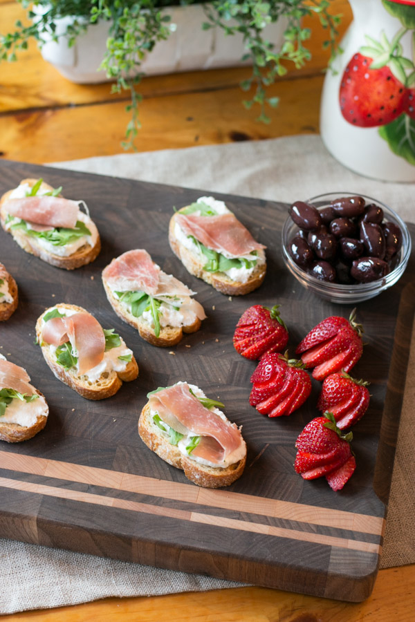 Prosciutto and Fig Butter Crostini with Ricotta and Arugula
