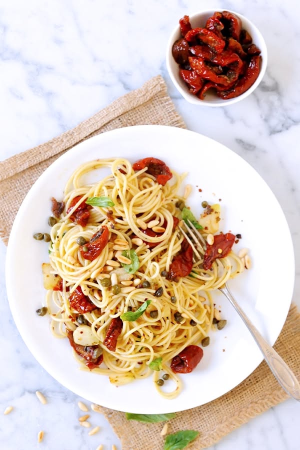 Spaghetti Tossed in Tomato-Basil Sauce with Toasted Pine Nuts