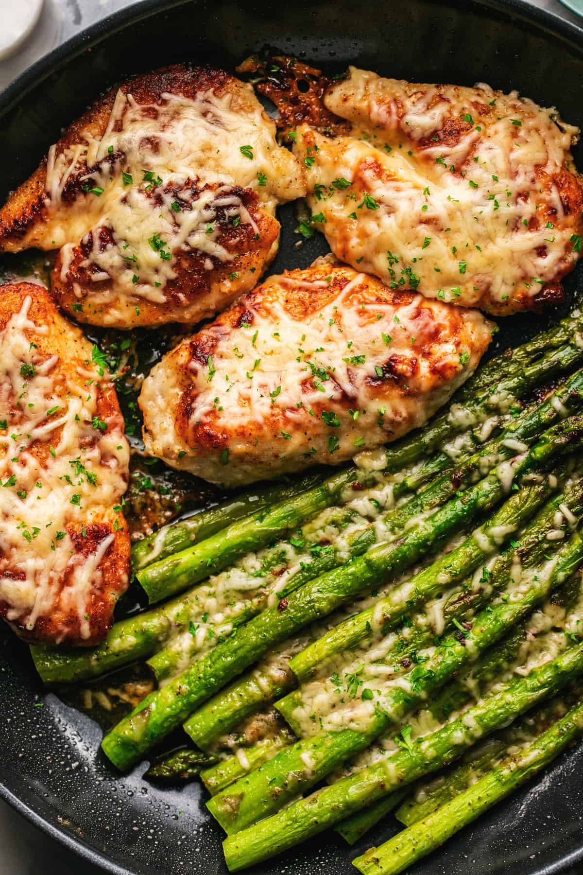 Crispy Parmesan-Crusted Chicken Thighs with Garlic-Asparagus