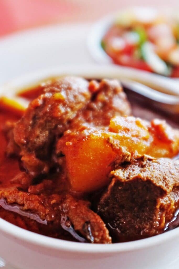 Slow-Cooked Lamb with Eggplant and Cinnamon-Spiced Tomato Sauce