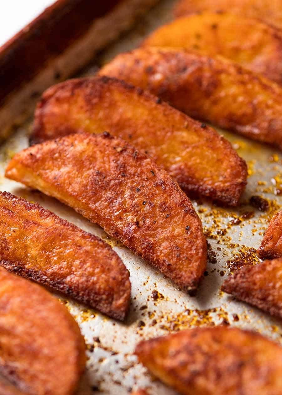 Sheet Pan Cajun-Spiced Pork with Sweet Potato Wedges