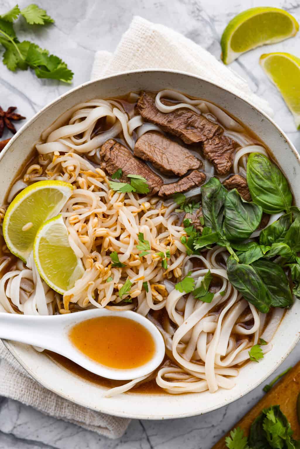 Slow-Simmered Beef Pho Broth with Fresh Rice Noodles