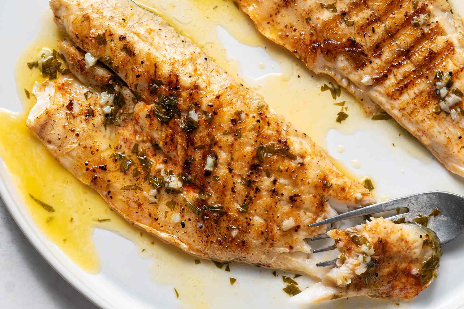 Italian Pan-Seared Sea Bass with Garlic Lemon Butter Sauce