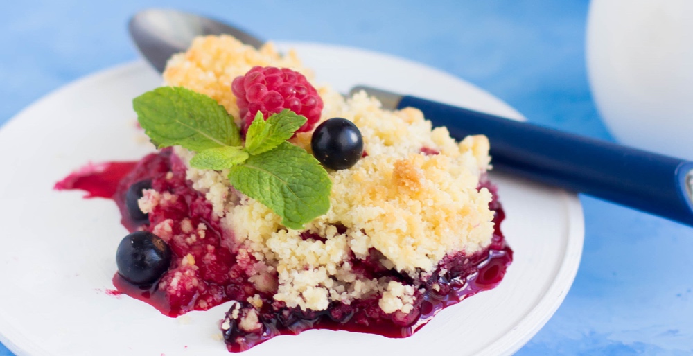 Alaskan Huckleberry & Oat Crumble with Whipped Cream