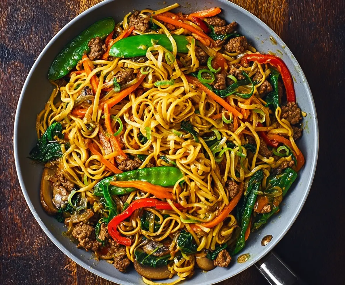 Stir-Fried Lao Ginger Noodles with Pork and Fresh Herbs