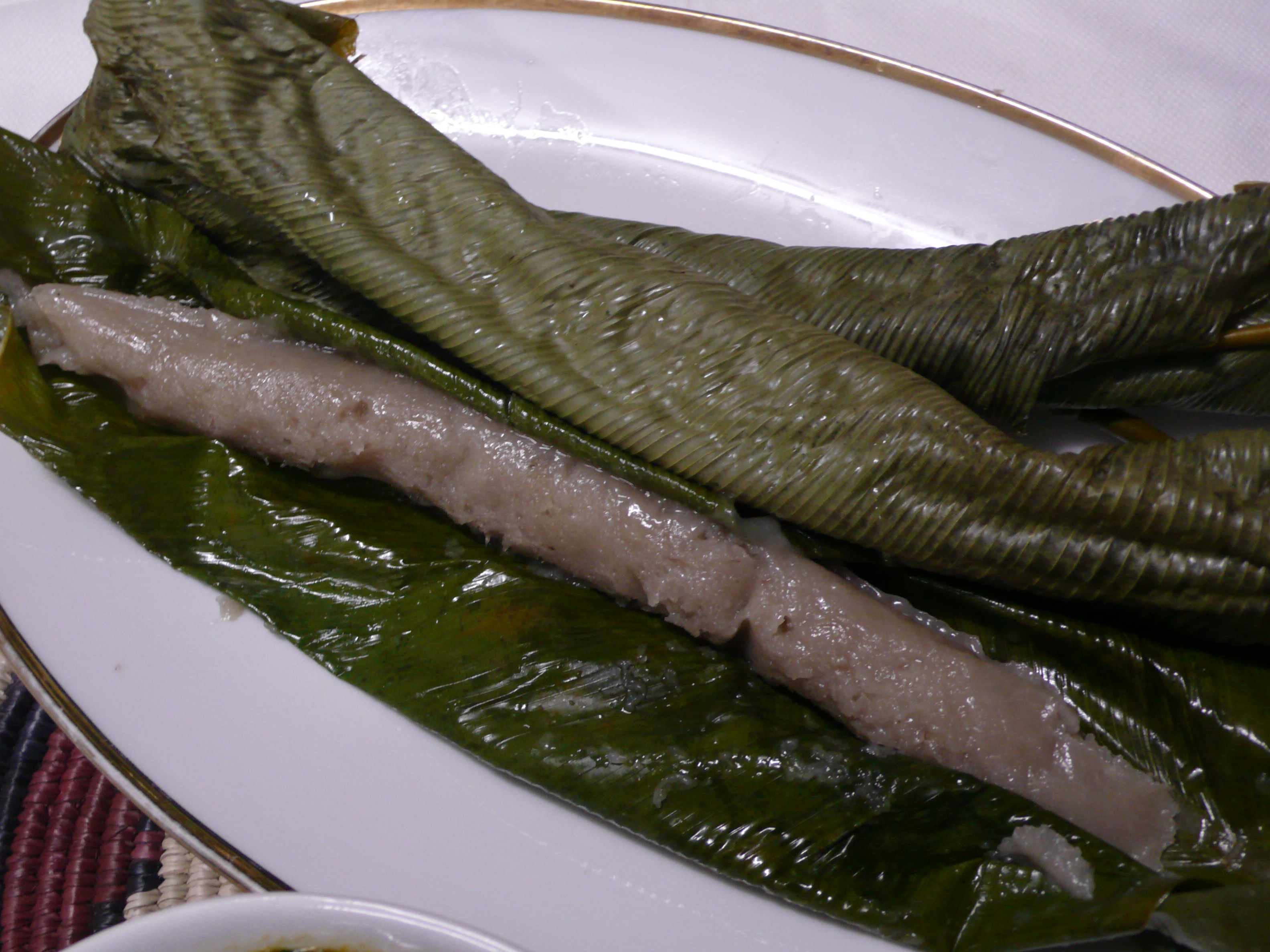 Steamed Cocoyam Leaves with Spiced Palm Nut Sauce