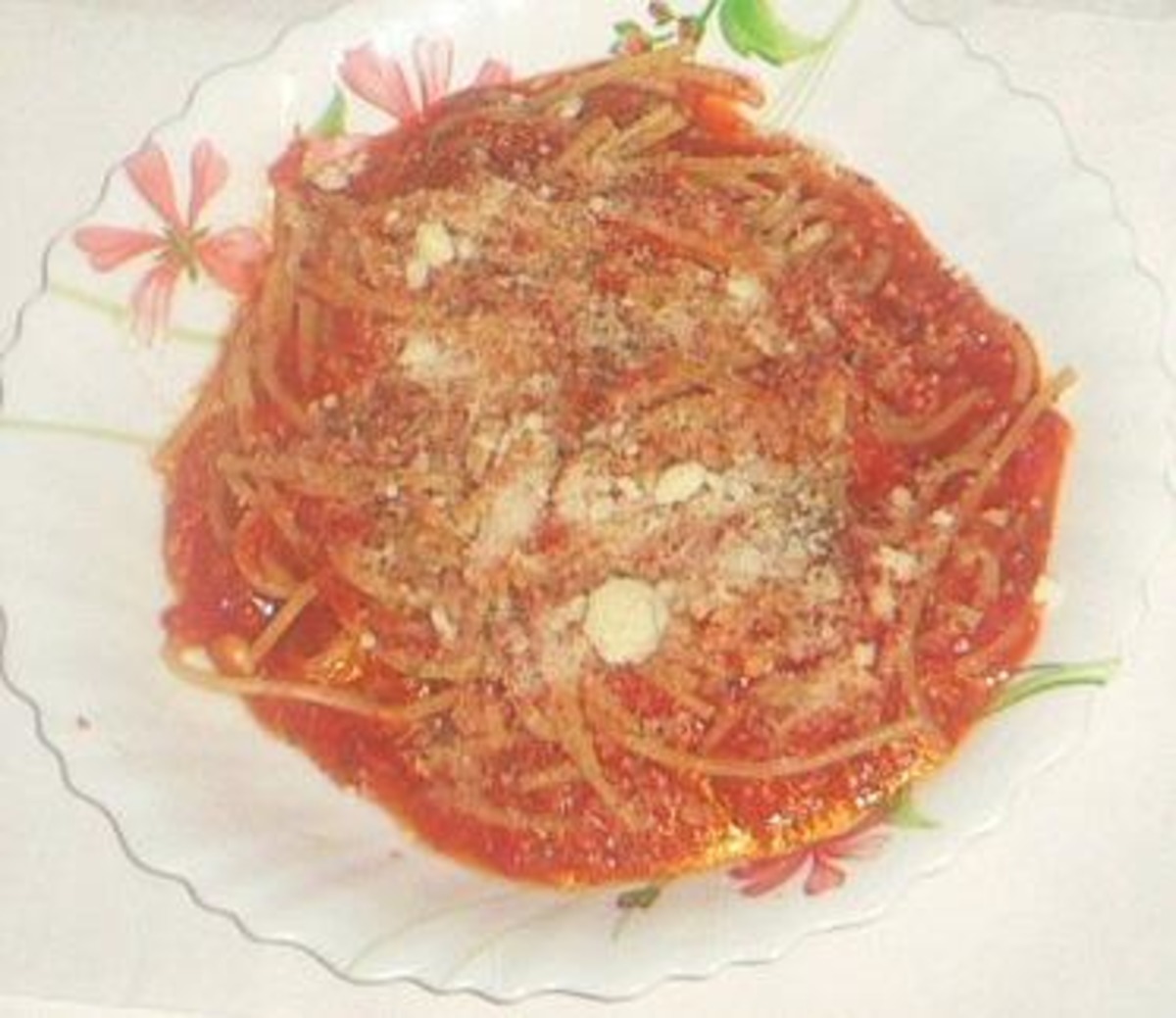Surnames Spaghetti with Herb-Infused Tomato Sauce