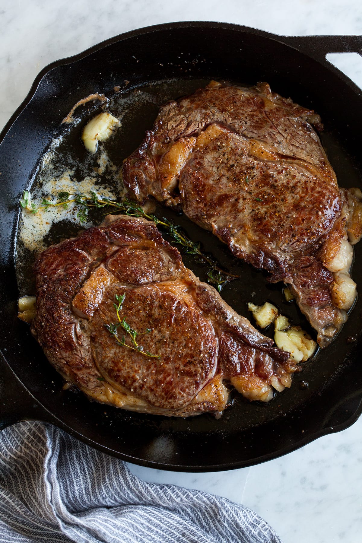 Pan-Seared Ribeye Steak with Garlic-Thyme Butter