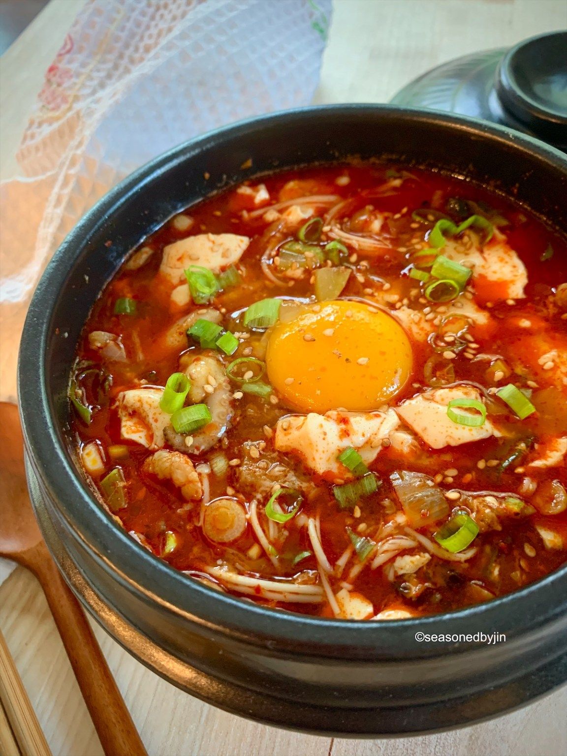 Spicy Seafood and Tofu Stew with Rice Cakes