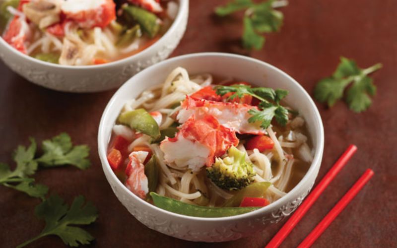 Spicy Beef and Crab Seafood Pho with Fresh Herbs