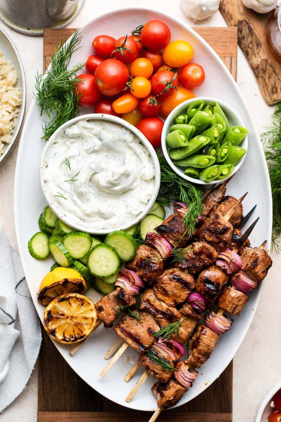 Grilled Citrus and Cumin-Spiced Pork Skewers with Yogurt Sauce