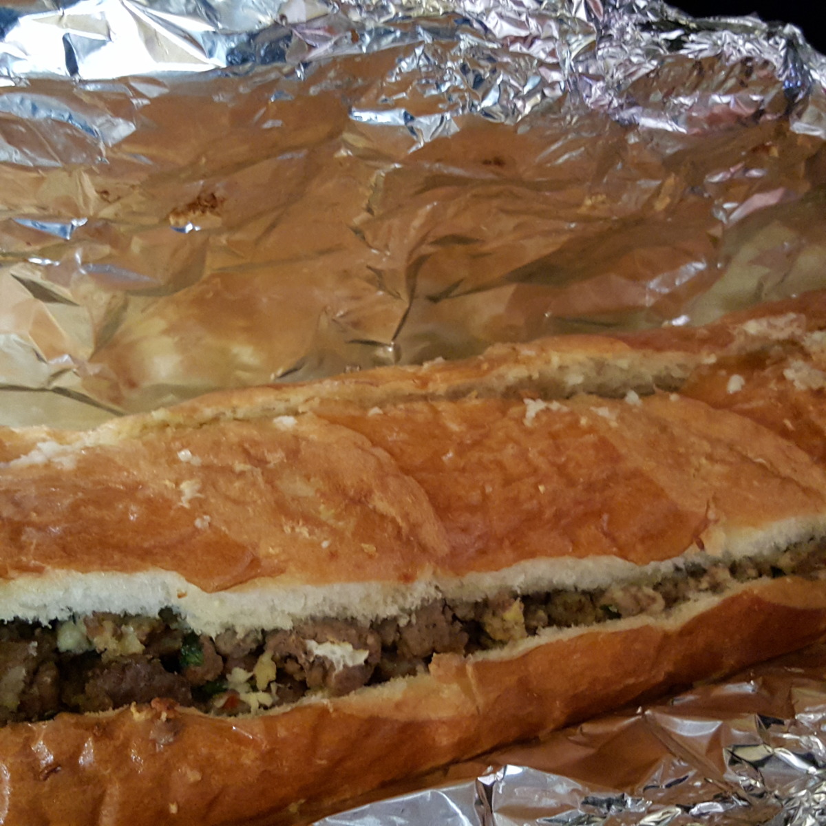 Sausage and Pepperoni Stuffed French Bread Sandwich