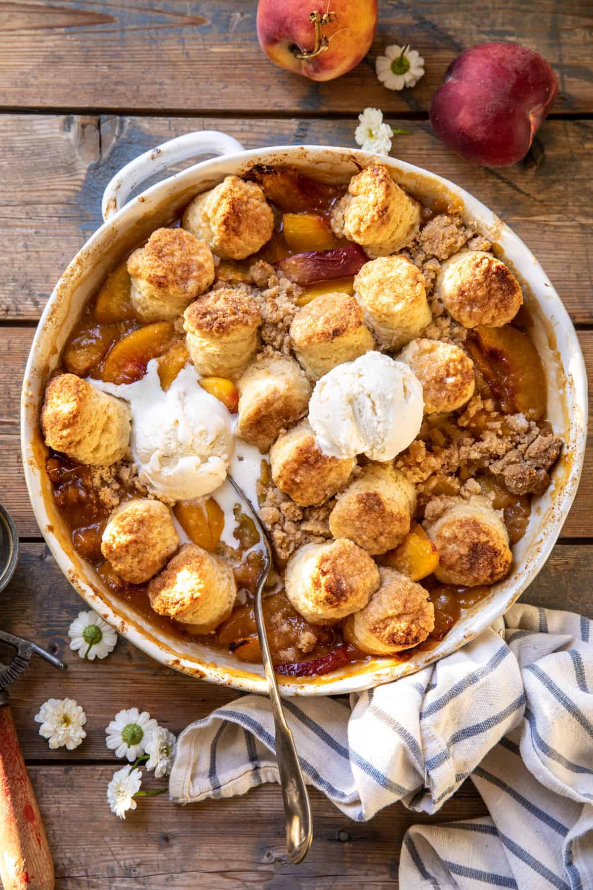 Whiskey-Soaked Peach Cobbler with Cinnamon Biscuit Topping