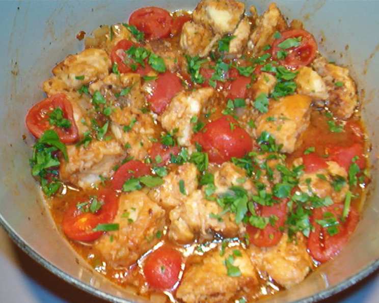 Berbere-Spiced Chicken Breast with Tomato and Onion Stew