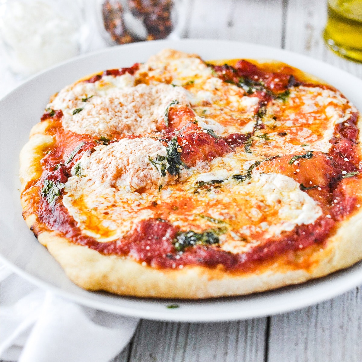 Neapolitan-Style Pizza Dough with Garlic-Infused Tomato Sauce