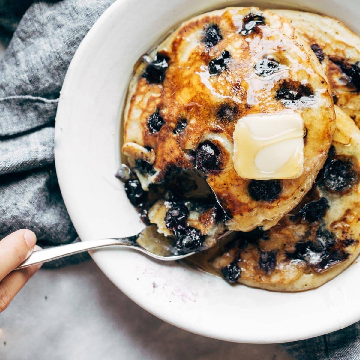 Snowy Vanilla Bean Pancakes with Blueberry Compote